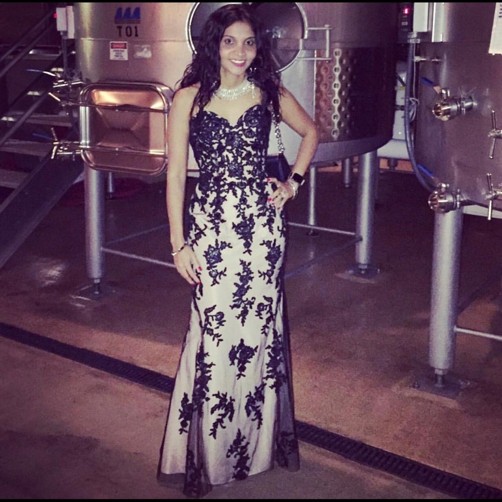 Black lace fitted formal gown.